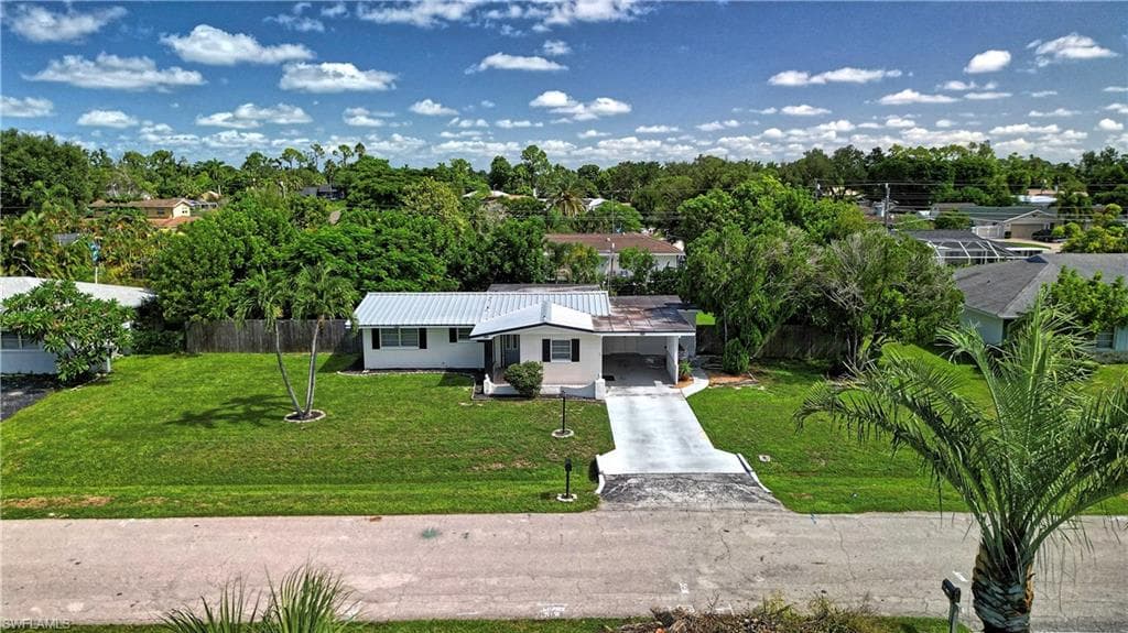 Lush green lawn and mature landscaping