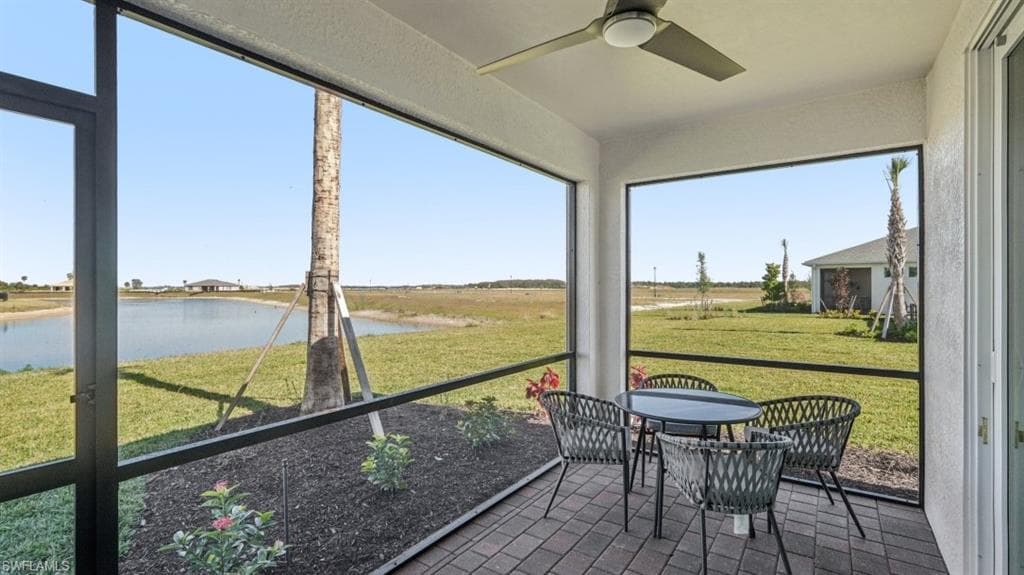 Screened patio featuring a paved surface, recessed lighting, and a ceiling fan