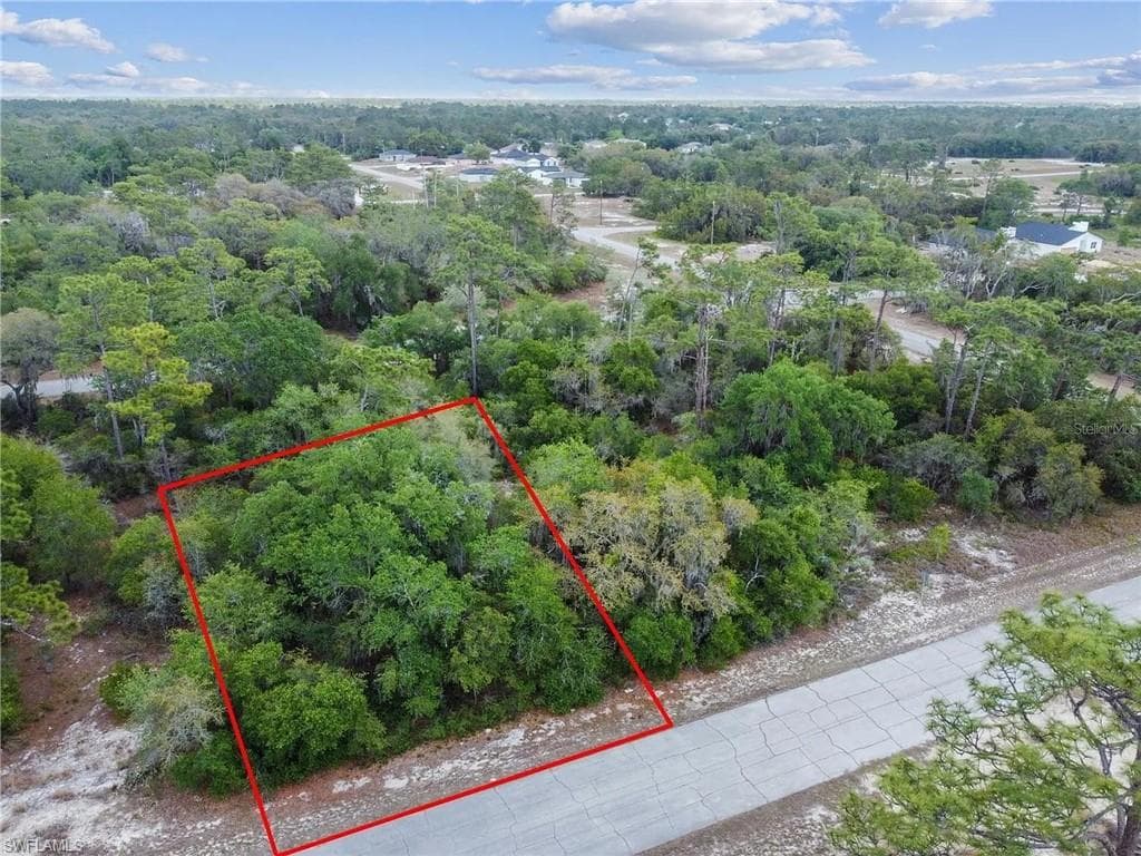 Wooded lot with road frontage