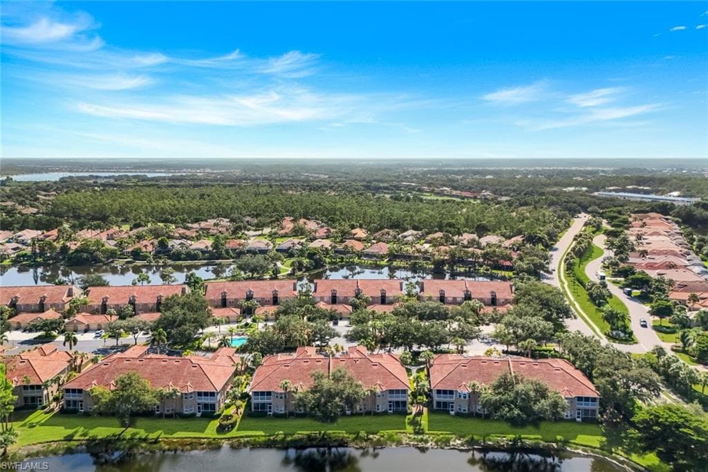 Aerial View of Sabal Palm Featuring Scenic Lakes, Tropical Landscaping, and Sabal Palm Community Pool