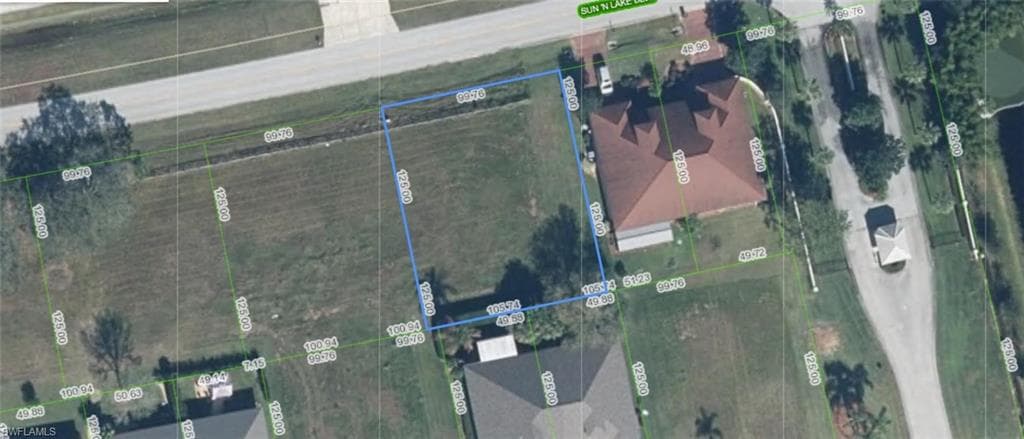 Property Survey. Aerial view indicating property boundaries and dimensions