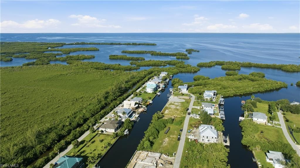 Waterfront community featuring canal access, private boat docks, and direct access to open water