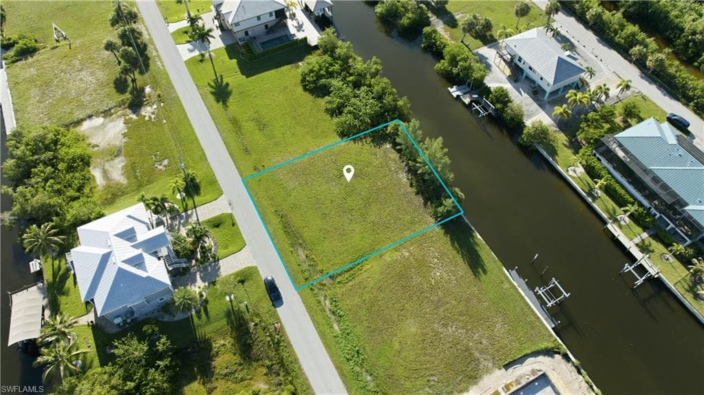 Canal-front lot with direct water access