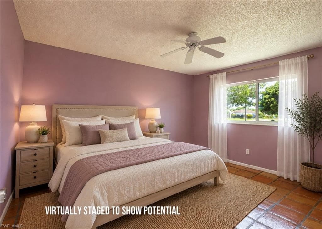 VIRTUALLY STAGED Window with natural light, ceiling fan, and tiled flooring
