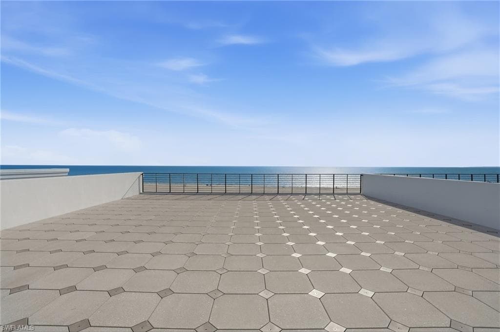 View of patio featuring a water view