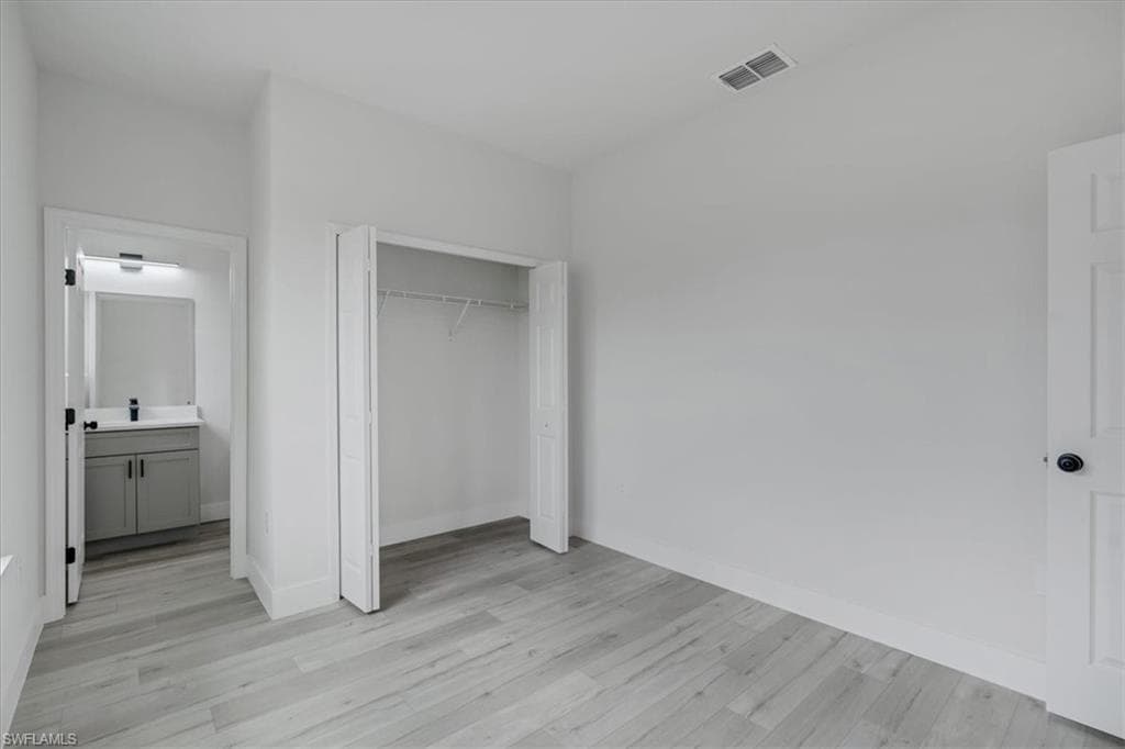 Bedroom 4 with private ensuite bath