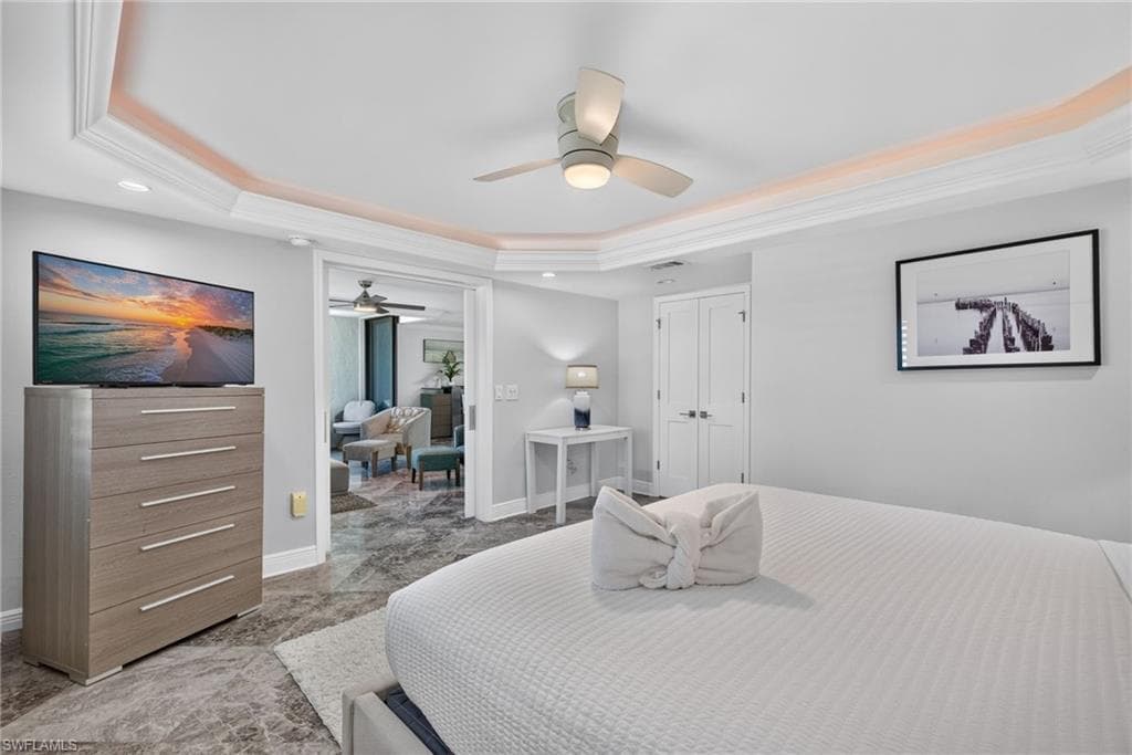 Primary bedroom w wide opening to living area