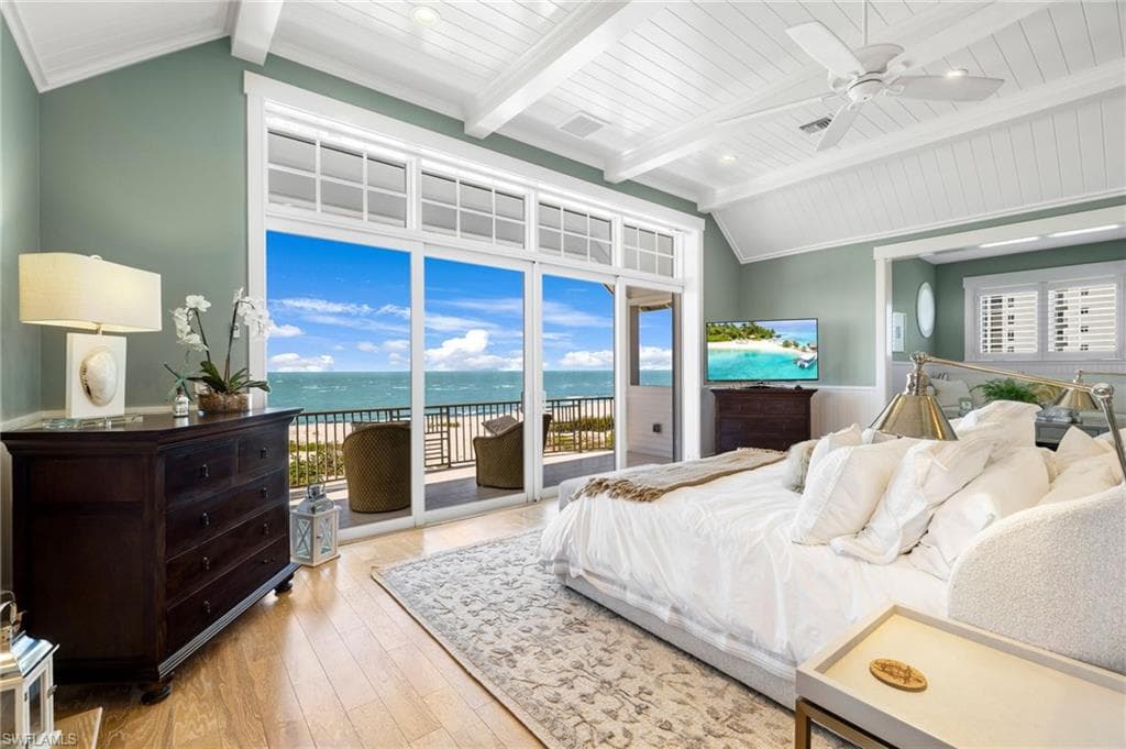 Primary suite with breathtaking gulf views - Virtually Edited