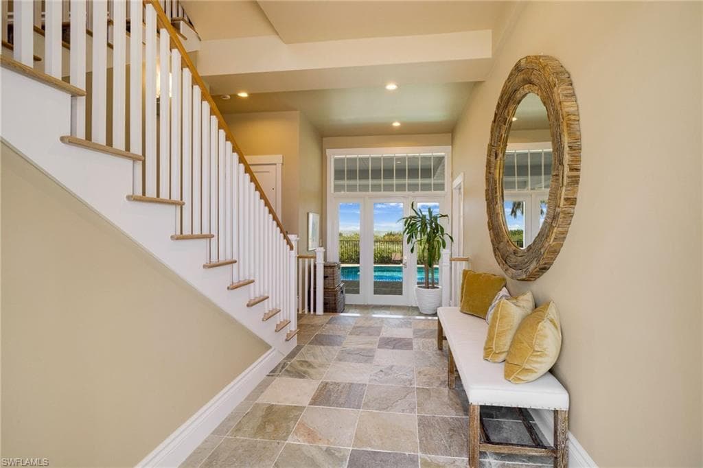 Foyer flooded with natural light - Virtually Edited