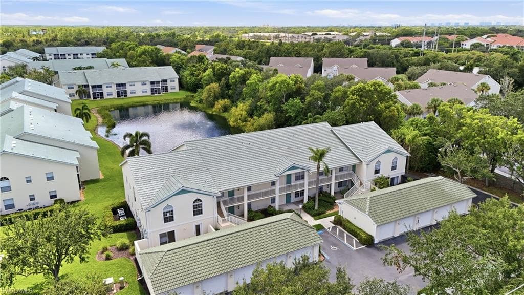 AERIAL VIEW - FRONT ELEVATION SHOWING 1-CAR GARAGE - END UNIT!!! BEAUTIFUL POND VIEWS..