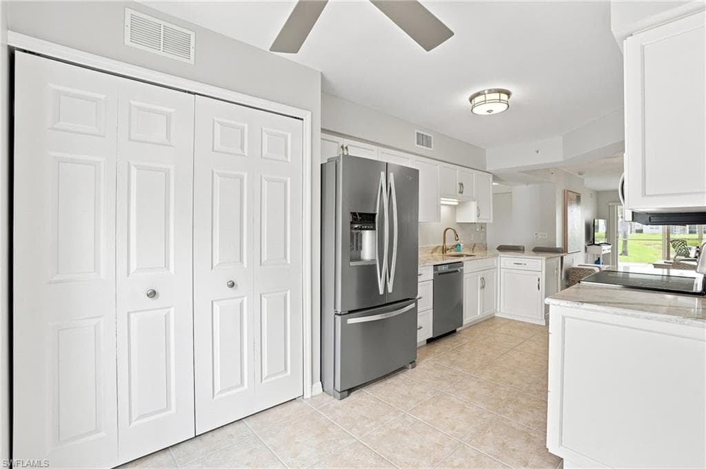 ENTERING KITCHEN FROM COURTYARD TERRACE LIVING SPACE