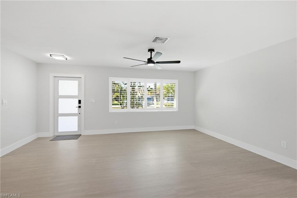 generous living room with new impact window