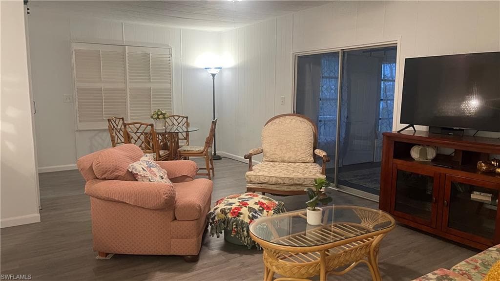 Living room featuring vinyl floors