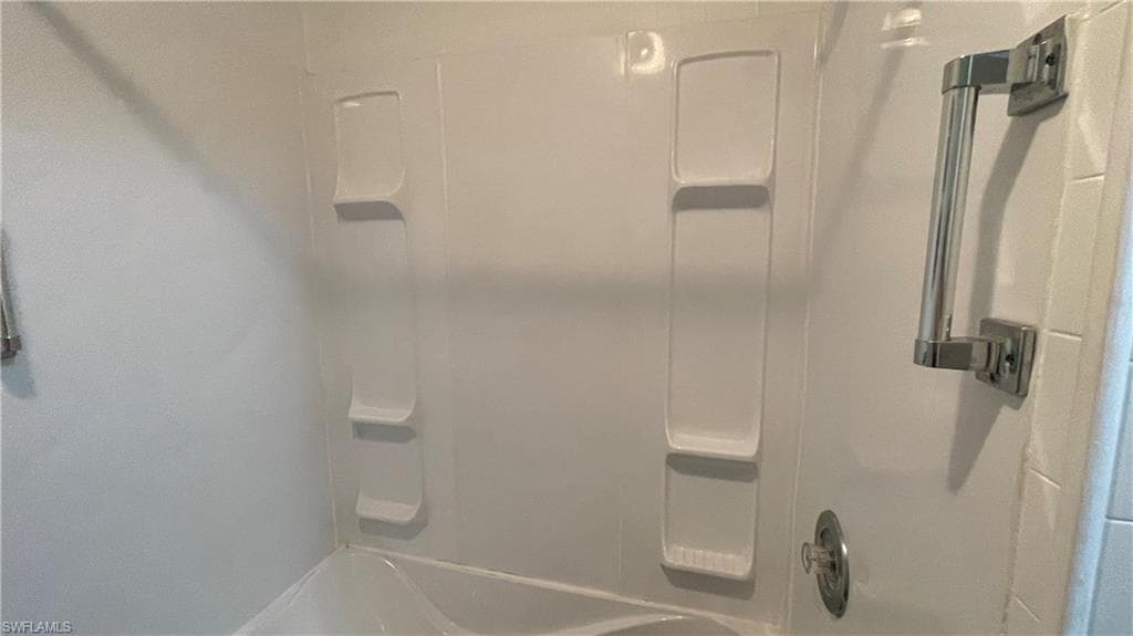 Bathroom featuring shower / bath combination