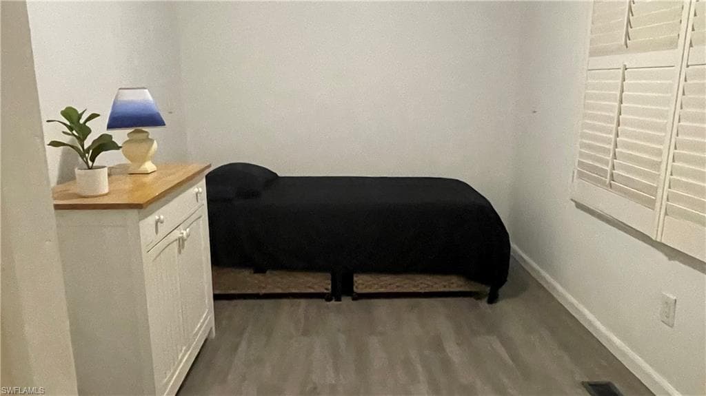 Den/Office/Bedroom with vinyl flooring